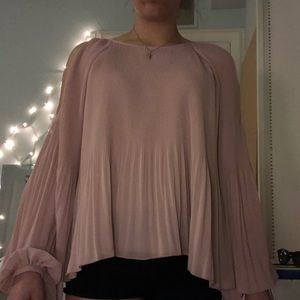 pink pleated blouse